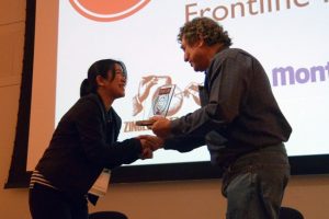 Miho Yamamoto accepting the FRONTLINE Award for Journalism in a Documentary Film at the Salem Film Fest for "The Exhibition."
