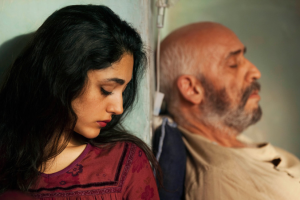 Golshifteh Farahani (L) and Hamid Djavadan (R) in "The Patience Stone." back to back