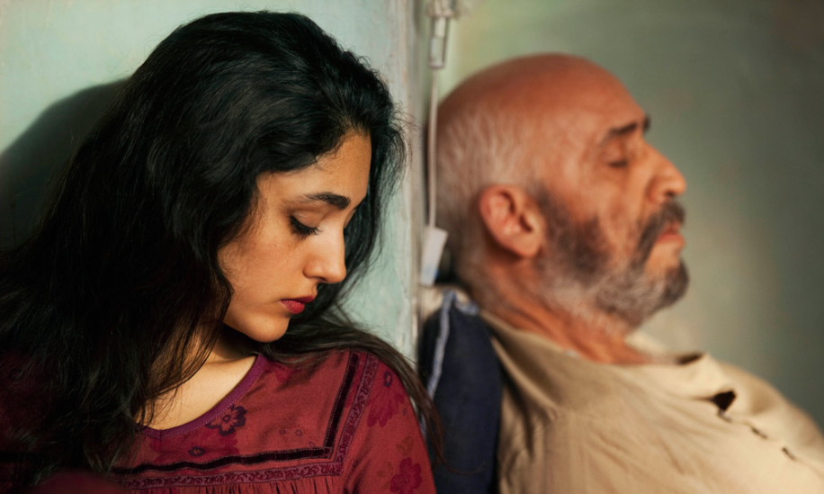 Golshifteh Farahani (L) and Hamid Djavadan (R) in "The Patience Stone." back to back