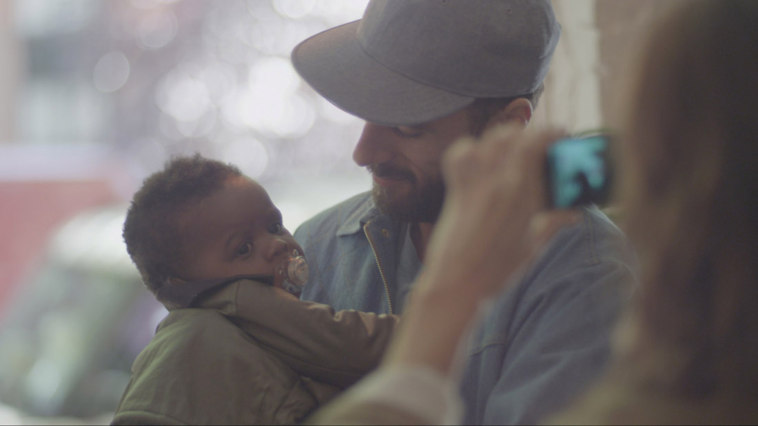 Writer/director Sebastian Silva and a baby in Nasty Baby