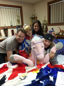 Horsing around on the set of The Bronze. From left to right, co-writer, Winston Rauch, co-writer and actress Melissa Rauch, producer Stephanie Langhoff, and director Bryan Buckley. Photo by Matt Lefebvre.