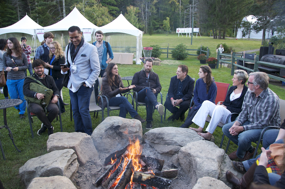 Filmakers surrounding a fire pit at IVTFest