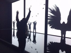 A festival goer participating in Chris Milk's The Treachery of Sanctuary in the New Frontier section of the 2016 Sundance Film Festival. (Photo by Neil Kendricks)