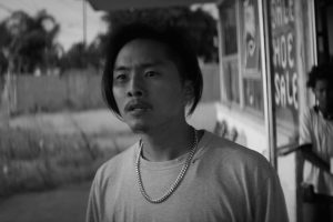 Black and white image of Justin Chon