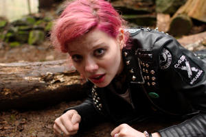 Chelsea (Chloe Levine) takes cover in The Ranger