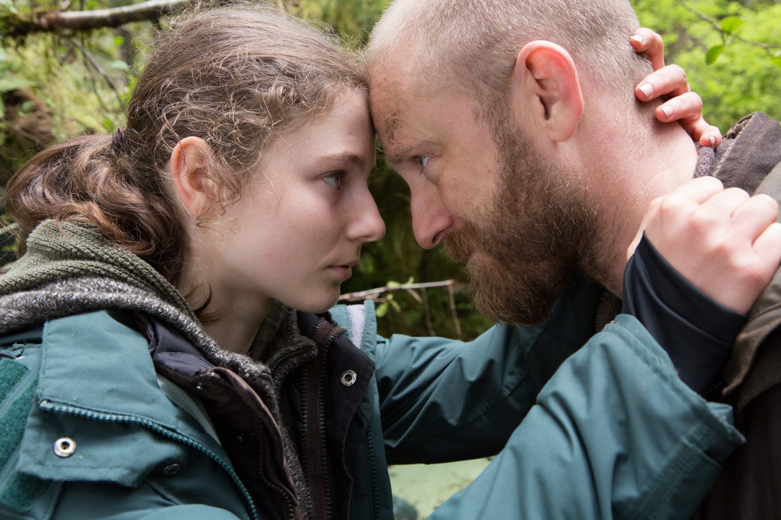 Thomasin McKenzie and Ben Foster put their heads together in Debra Granik's film Leave No Trace.