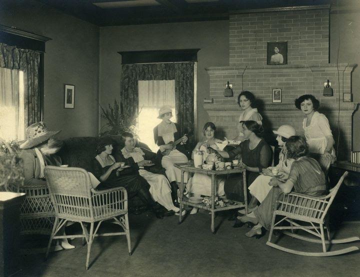 An old photo of women in a dormitory.
