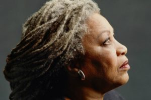 A profile shot of Toni Morrison with the back of her hair cast in shadow from the documentary Toni Morrison: The Pieces I Am