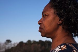 Claudia Lacy looks out into the distance in the documentary Always in Season