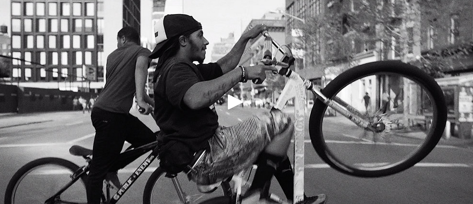 A black and white photo of Bam and Rawls riding their bikes