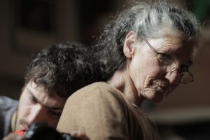 Beniamino Barrese rests his head on his mother Benedetta Barzini in his documentary The Disappearance of My Mother.