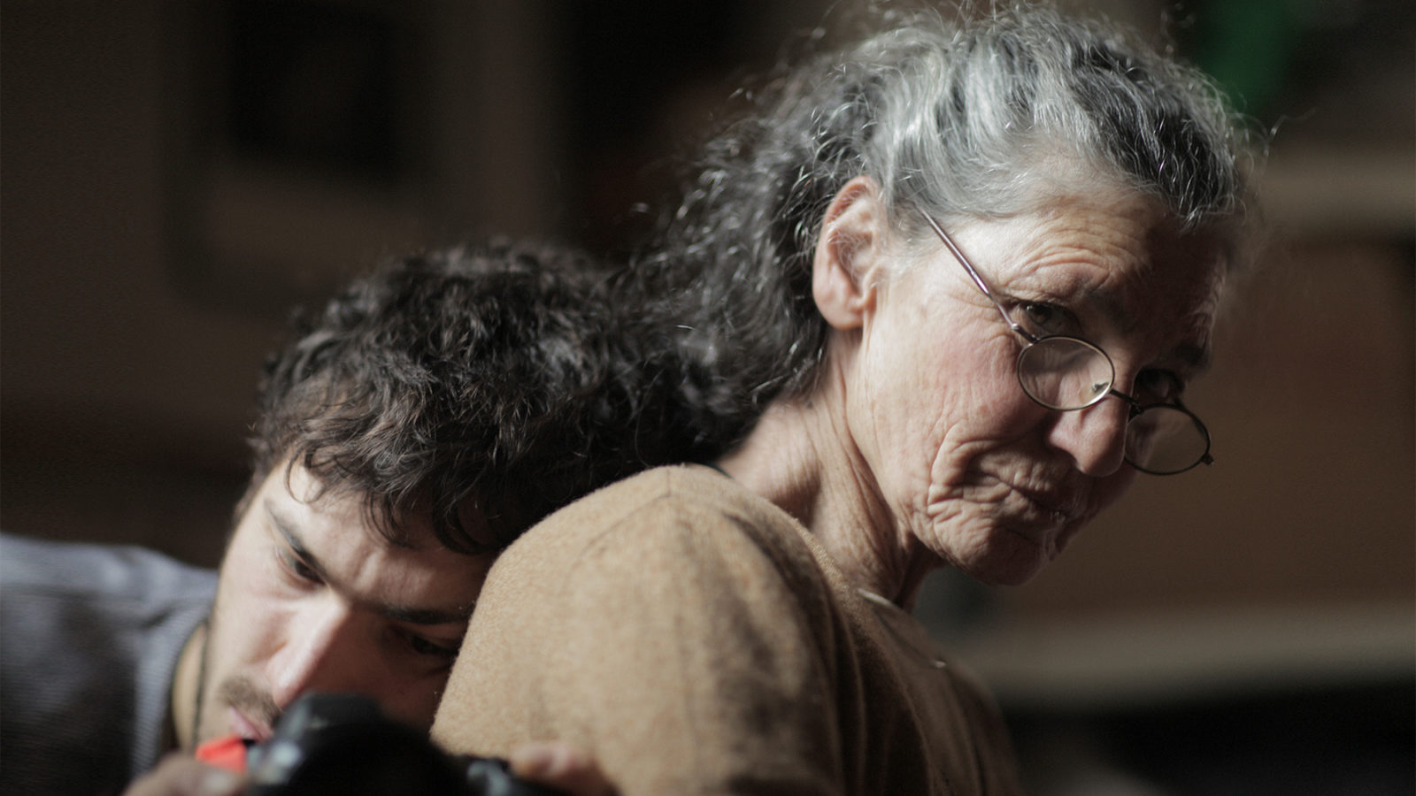 Beniamino Barrese rests his head on his mother Benedetta Barzini in his documentary The Disappearance of My Mother.