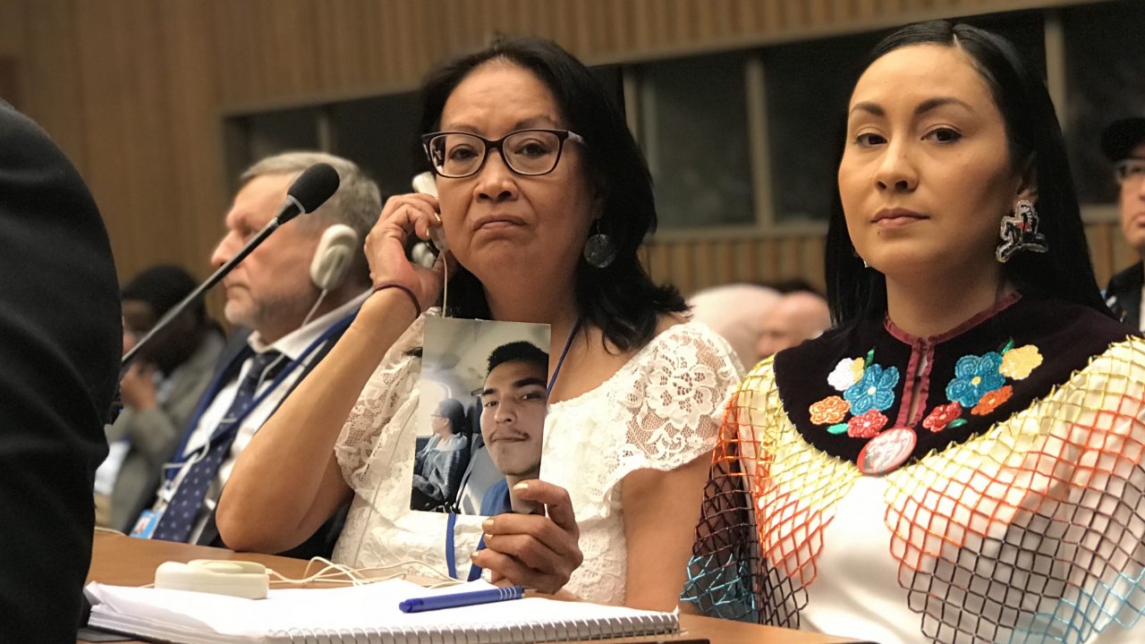 Coulton Bushie's mother and his cousin wait to speak to the U.N. about his death in nîpawistamâsowin: We Will Stand Up