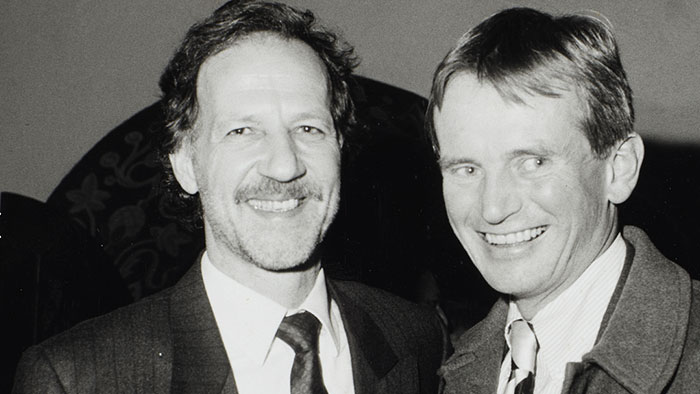 Werner Herzog stands smiling with his friend Bruce Chatwin in a black and white photo