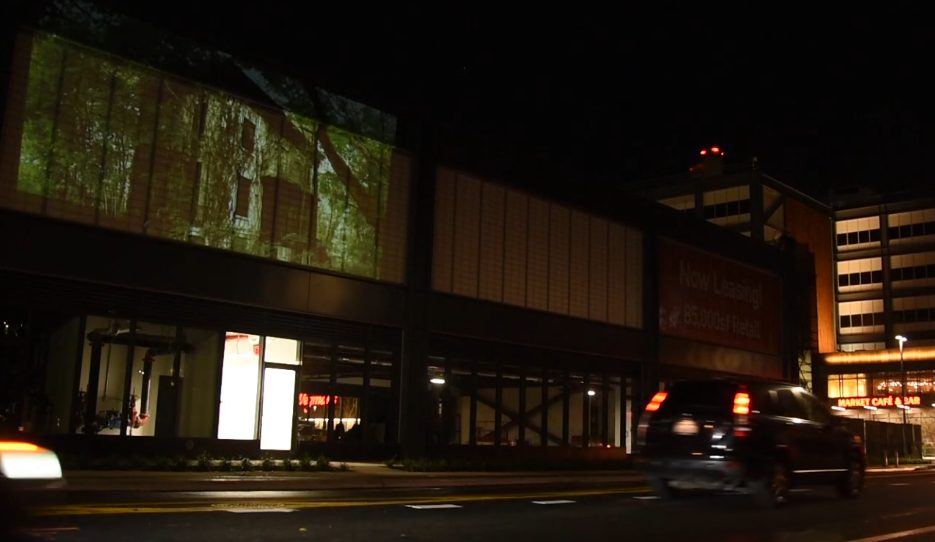 Old home projection on night street