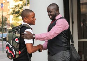 Student, administrator outside school