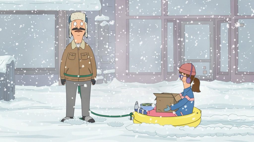 Bob pulls Gayle in his sled on a snowy Thanksgiving.