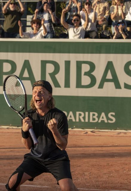 Alex on the tennis court.