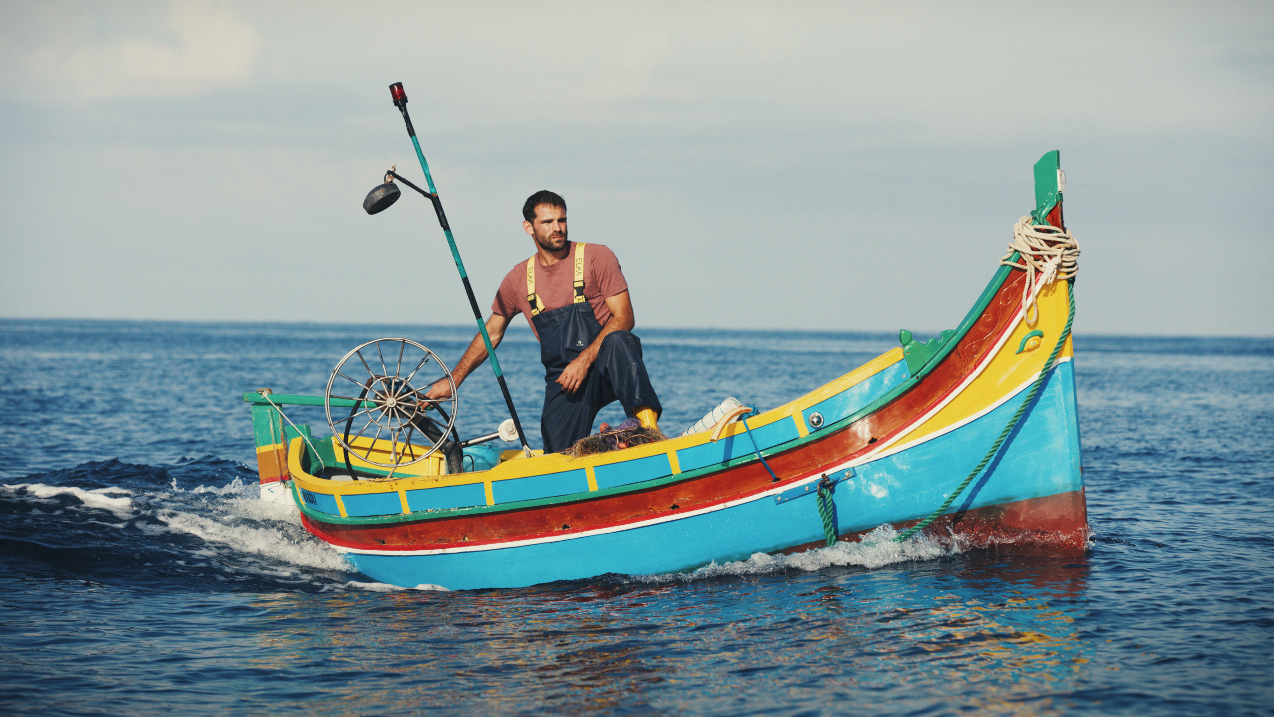 Fisherman in boat.