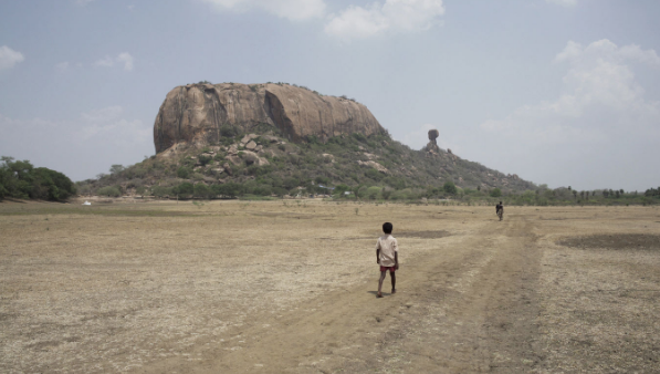 Child and father in dessert landscape