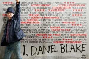 Man with raised fist in front of critical acclaim for I, Daniel Blake
