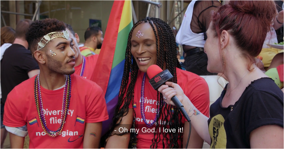 Fiona with two marchers at Stonewall 50. Captioned "Oh my God! I love it!"