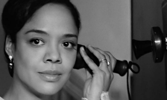 Tessa Thompson on phone.