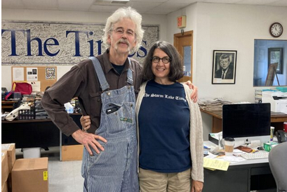 Art and Delores Cullen in newspaper offices.