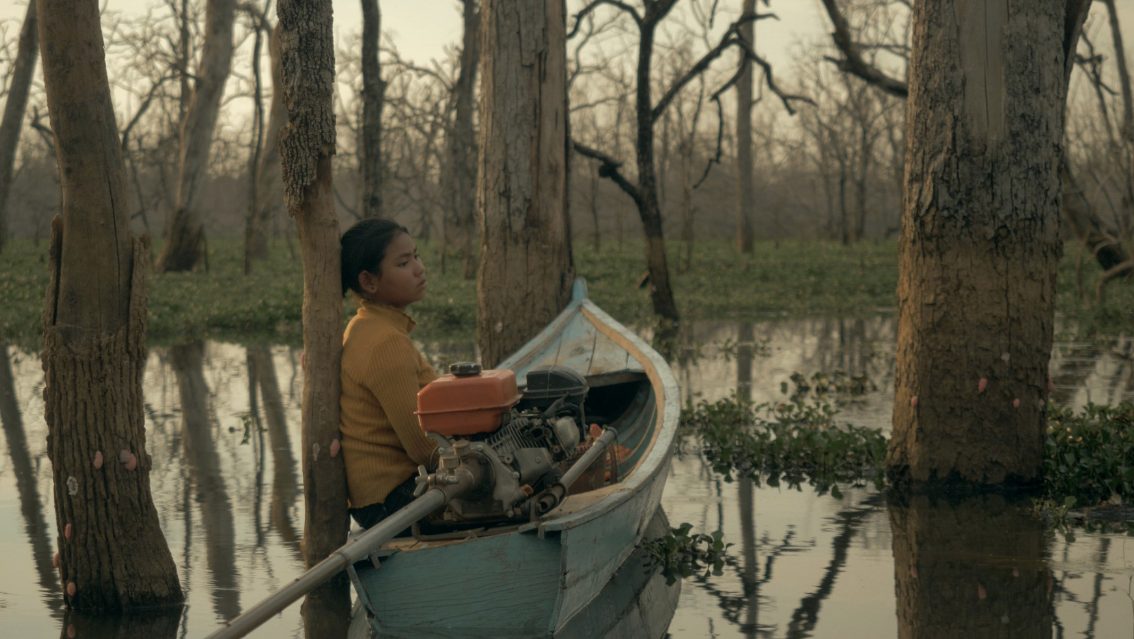 Woman in boat.