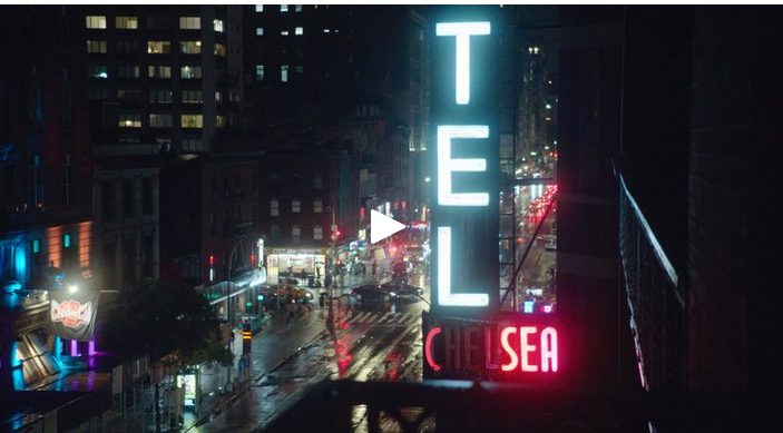 Chelse Hotel's neon sign at night.