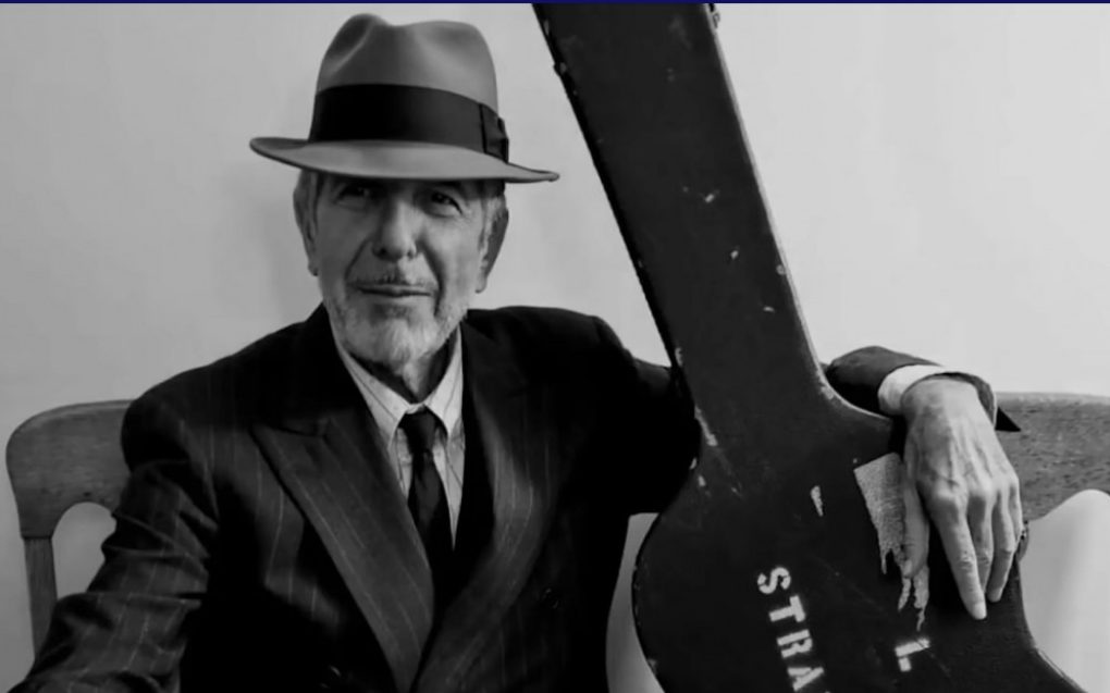 Leonard Cohen and guitar.
