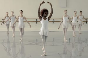 Black girl at ballet class.