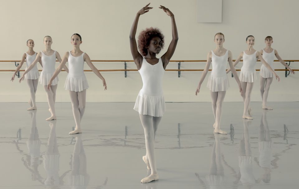 Black girl at ballet class.