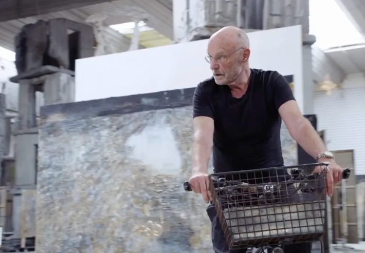 KIEFER ON BIKE IN HUGE STUDIO