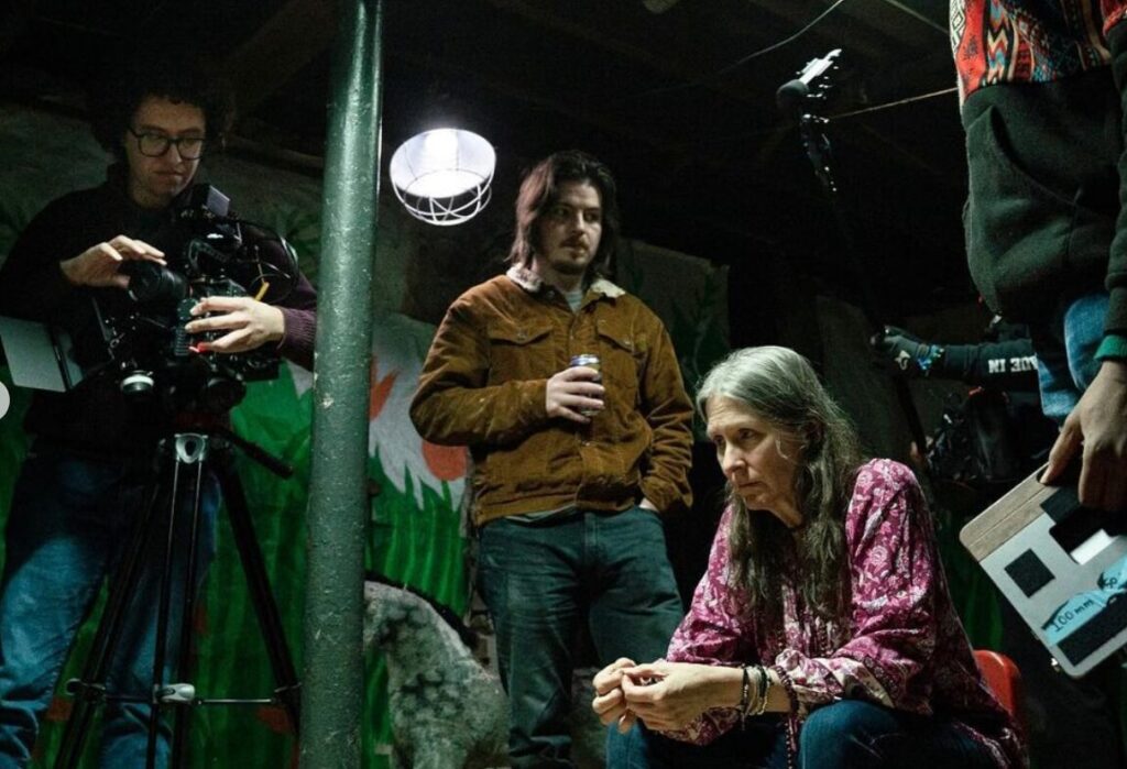 Four people on a film set.