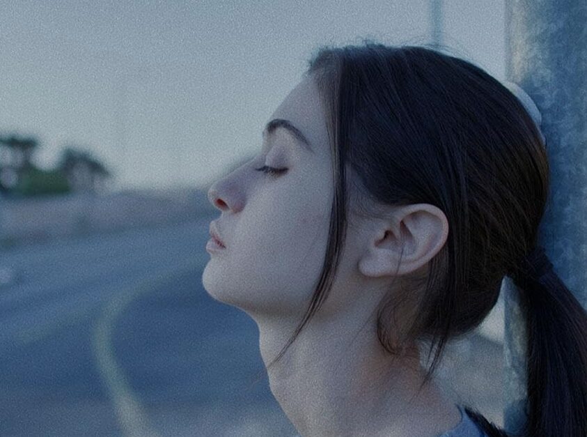 Girl in profile.