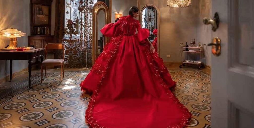 Woman in flowing dress.