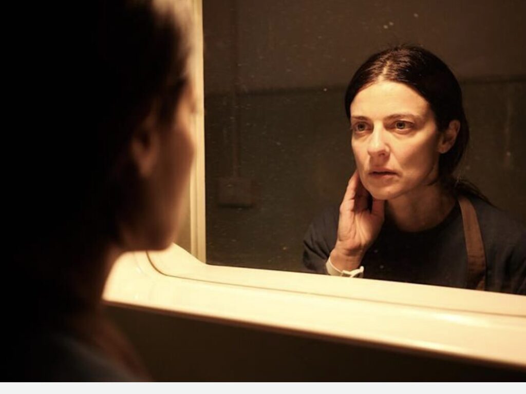 Woman in mirror